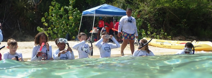 Students practice safety and buddy checks prior to snorkels.